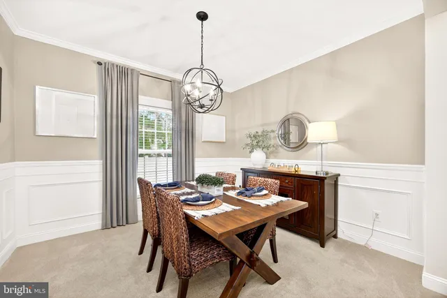 a kitchen with stainless steel appliances granite countertop a sink stove and microwave