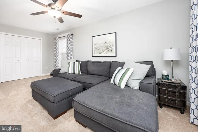a outdoor space with patio furniture and a potted plant