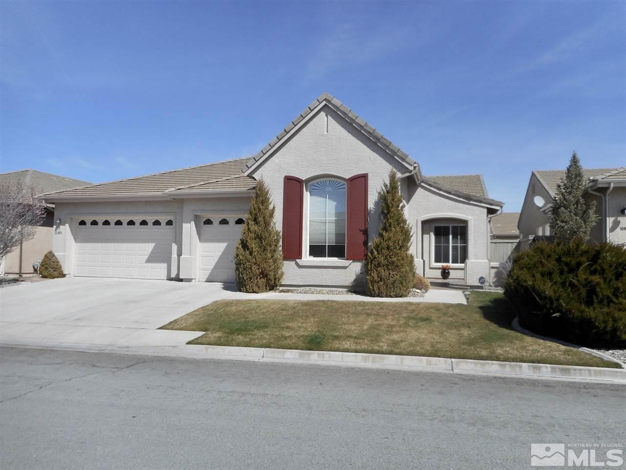 1675 Sunhaven Court Reno, NV 89521 - Photo 1 of 1 a view of white house with a yard and potted plants