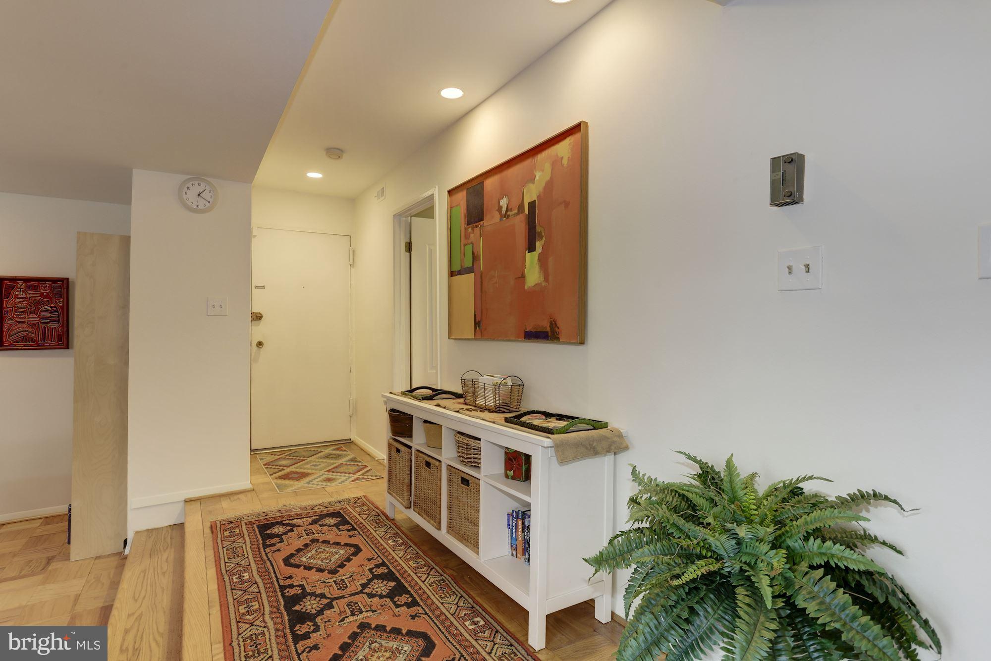 2016 Coleridge Drive, Unit 202 Silver Spring, MD 20902 - Photo 2 of 30 ENTRY WITH HARDWOOD FLOOR AND HALL CLOSET