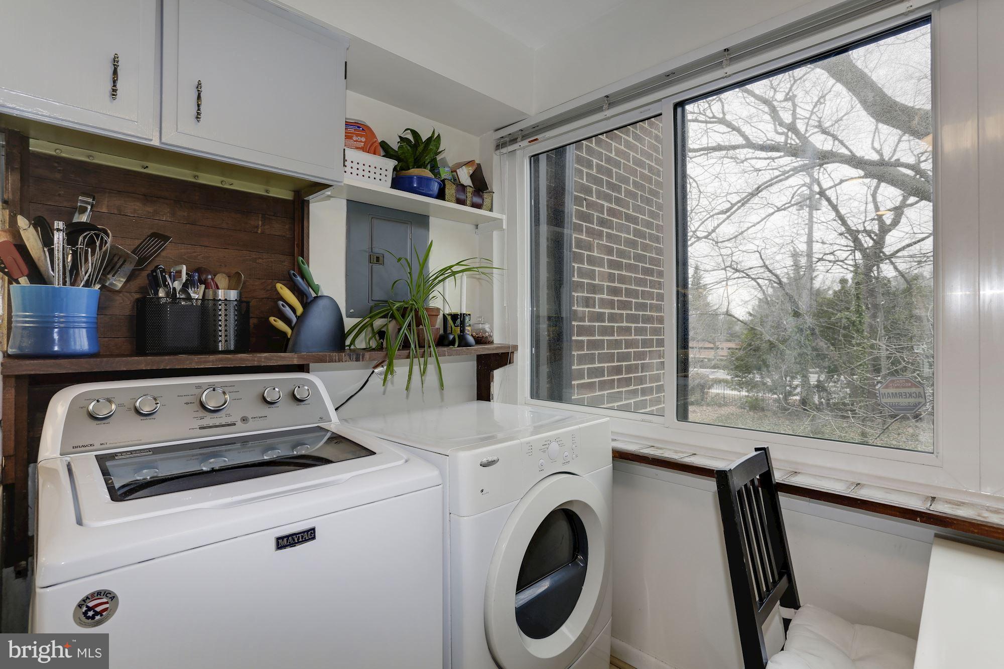 2016 Coleridge Drive, Unit 202 Silver Spring, MD 20902 - Photo 13 of 30 FULL SIZE WASHER AND DRYER LOCATED AT END KITCHEN