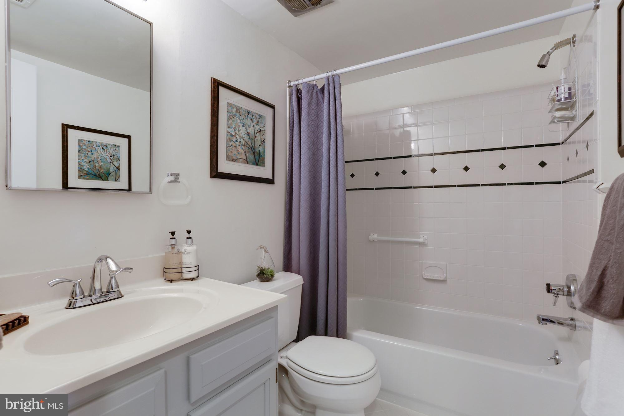 2016 Coleridge Drive, Unit 202 Silver Spring, MD 20902 - Photo 20 of 30 UPDATED HALL BATHROOM WITH TUB AND CERAMIC TILE