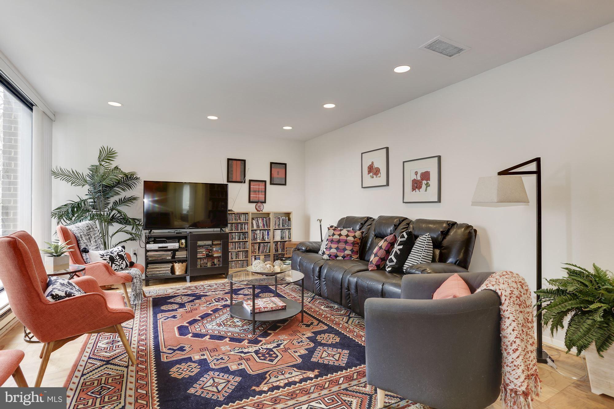 2016 Coleridge Drive, Unit 202 Silver Spring, MD 20902 - Photo 5 of 30 SPACIOUS LIVING ROOM WITH PARQUET FLOORS