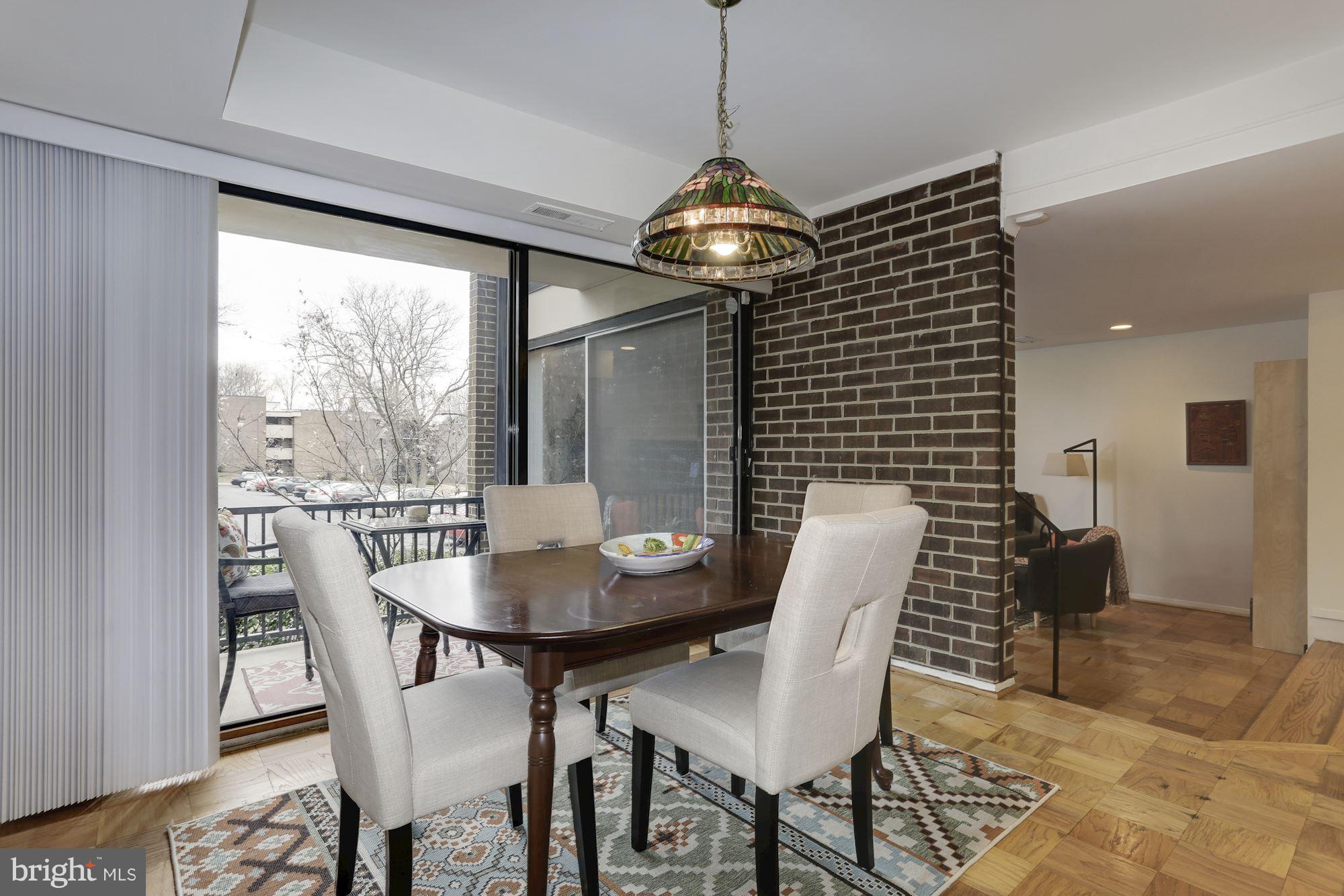 2016 Coleridge Drive, Unit 202 Silver Spring, MD 20902 - Photo 7 of 30 SEPARATE DINING HAS WOOD FLOORS PLUS BALCONY ACCES