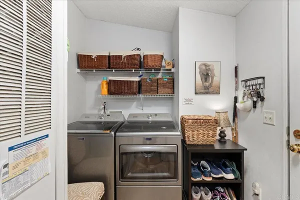 a kitchen with stainless steel appliances a stove a sink and a refrigerator