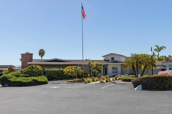 a view of a patio with wooden floor
