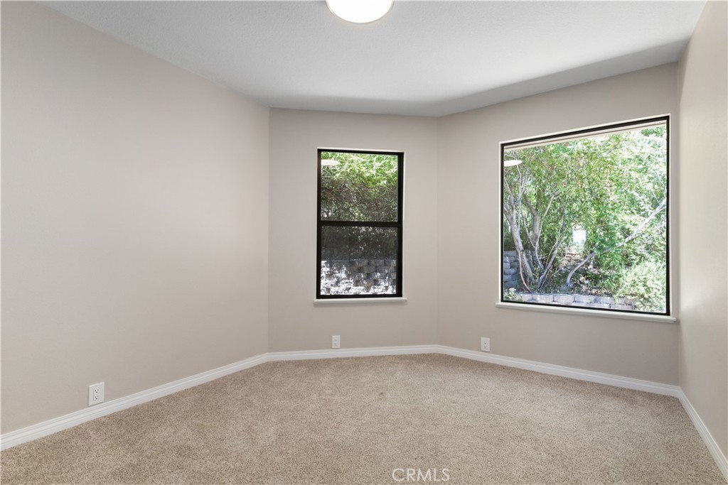14220 El Monte Road Atascadero, CA 93422 - Photo 37 of 61 an empty room with windows