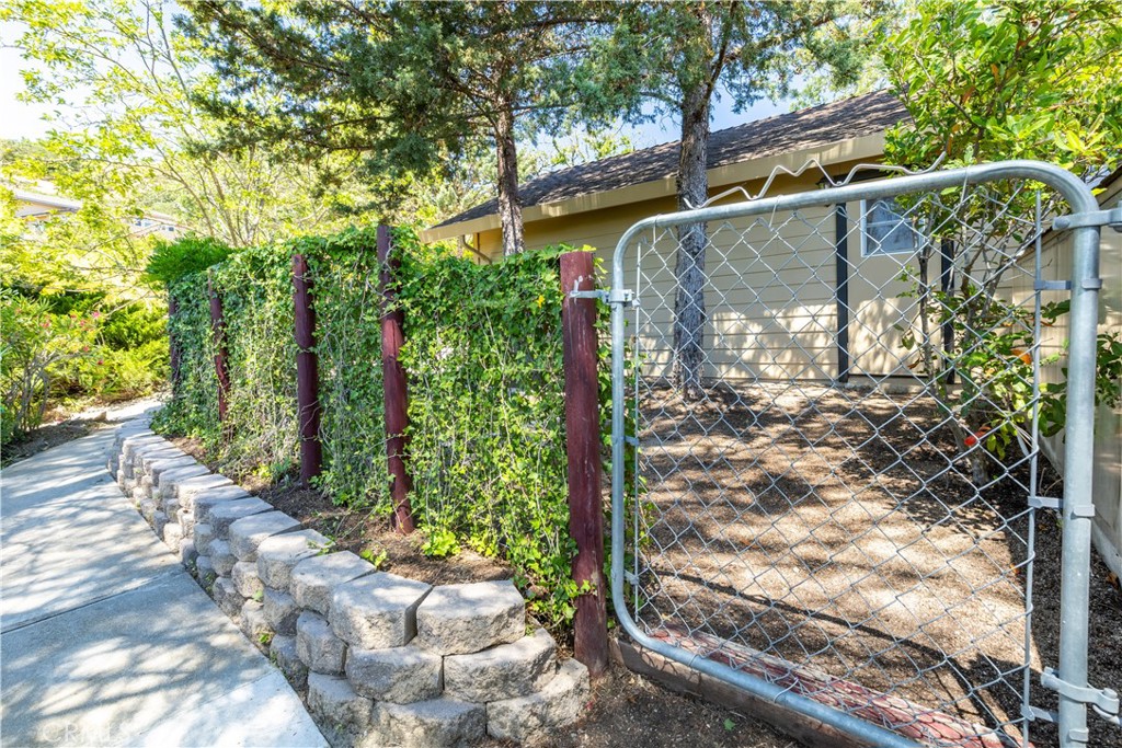 14220 El Monte Road Atascadero, CA 93422 - Photo 57 of 61 a view of a pathway of a house with a tree