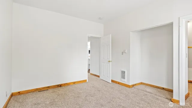 a view of hallway with closet