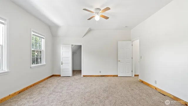 a bathroom with a bathtub and toilet