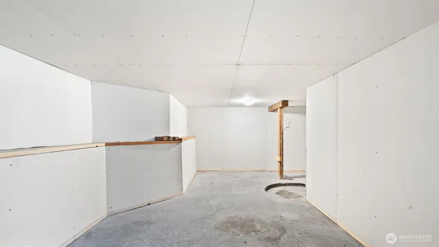 a view of a hallway with staircase