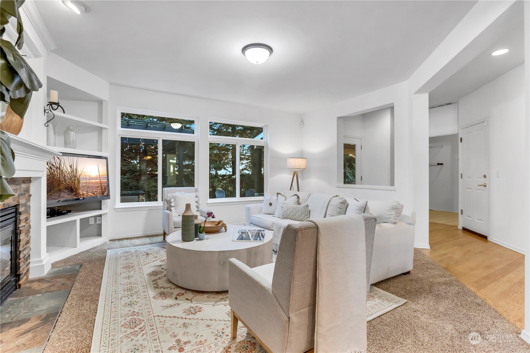 3210 187th Place Southeast Bothell, WA 98012 - Photo 12 of 39 a living room with furniture fireplace and flat screen tv