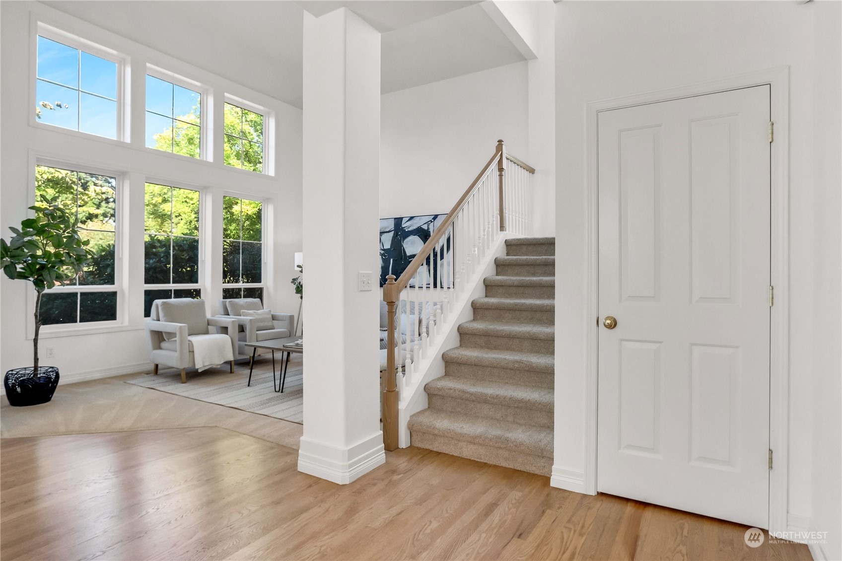 3210 187th Place Southeast Bothell, WA 98012 - Photo 14 of 39 a view of an entryway with wooden floor and windows