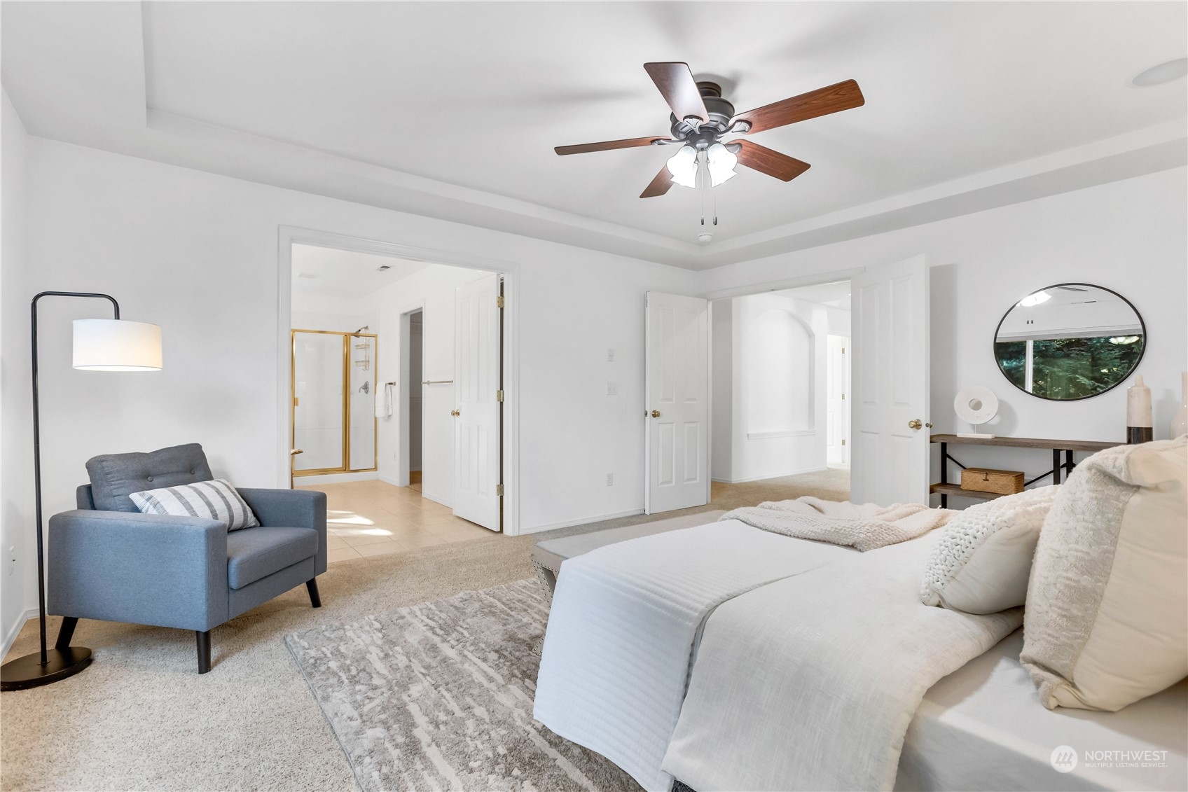 3210 187th Place Southeast Bothell, WA 98012 - Photo 18 of 39 a bedroom with a large bed and a couch