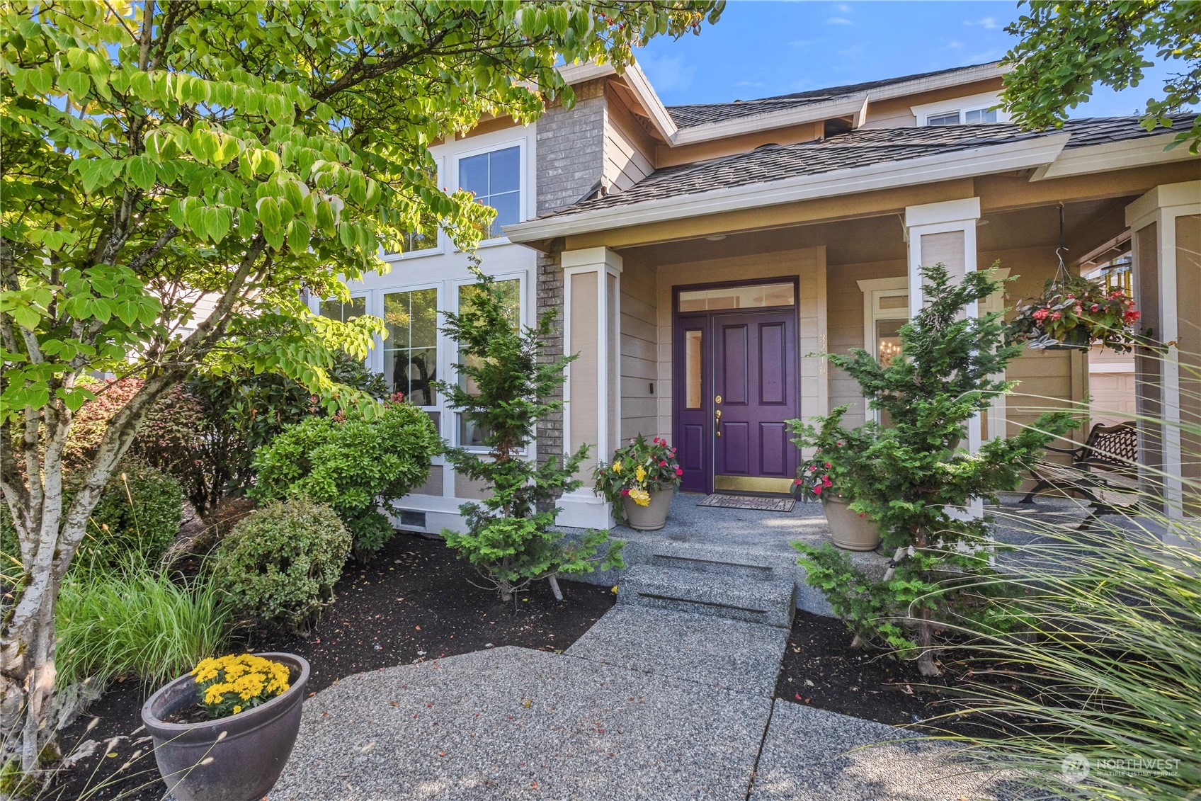 3210 187th Place Southeast Bothell, WA 98012 - Photo 2 of 39 front view of a house with potted plants