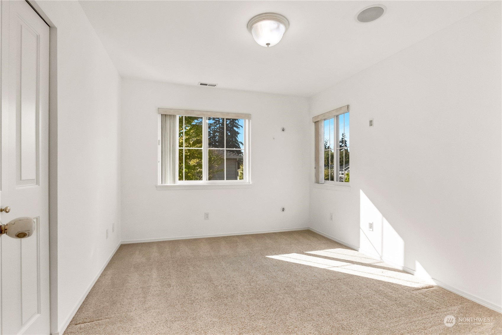 3210 187th Place Southeast Bothell, WA 98012 - Photo 25 of 39 an empty room with windows