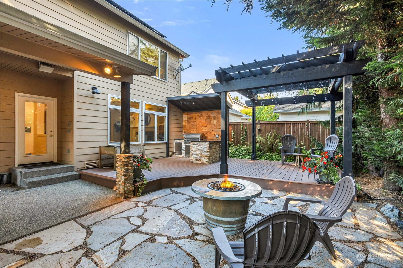 3210 187th Place Southeast Bothell, WA 98012 - Photo 36 of 39 a view of outdoor dining space with a table and chairs