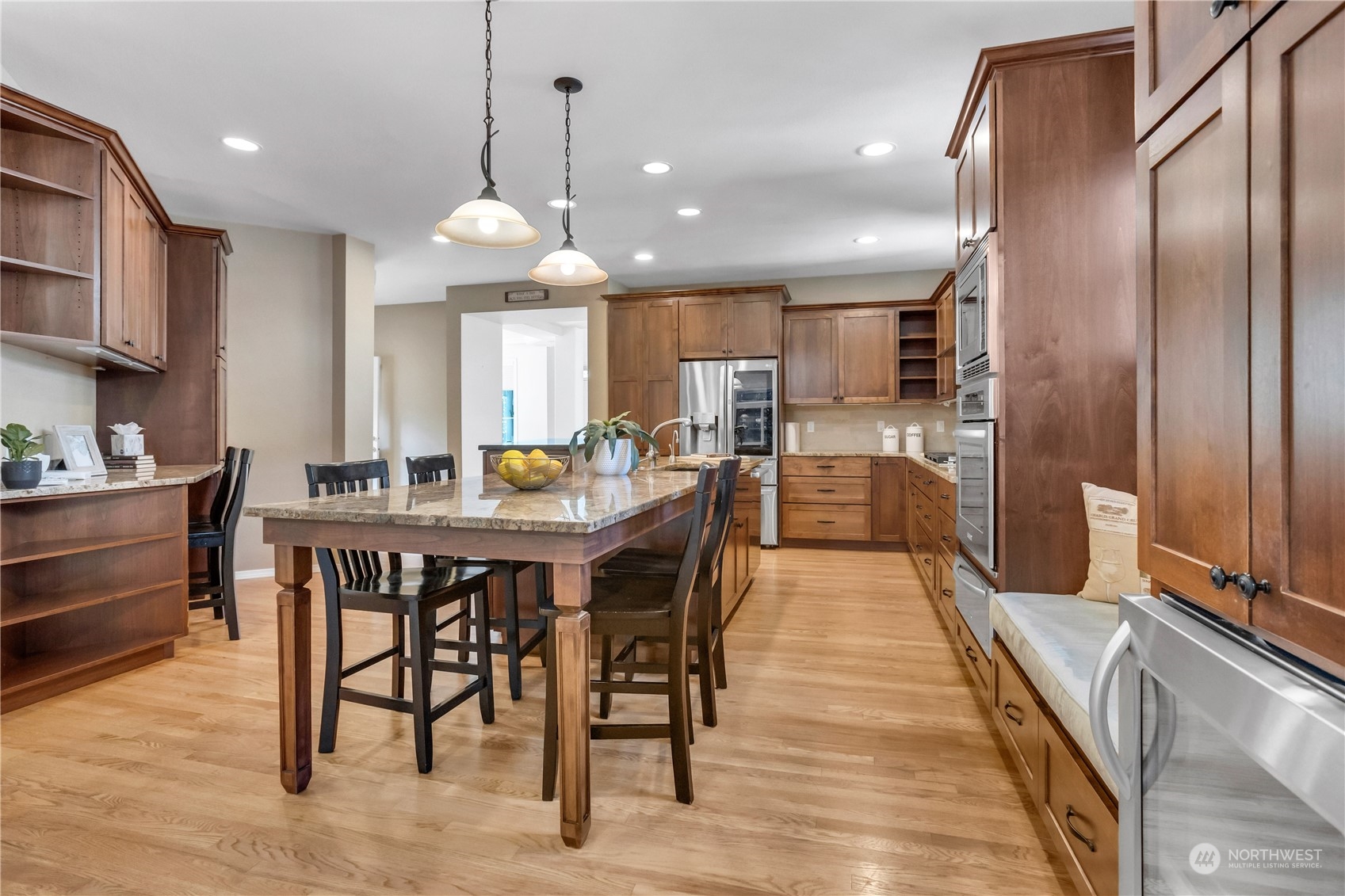 3210 187th Place Southeast Bothell, WA 98012 - Photo 9 of 39 a large kitchen with a table and chairs