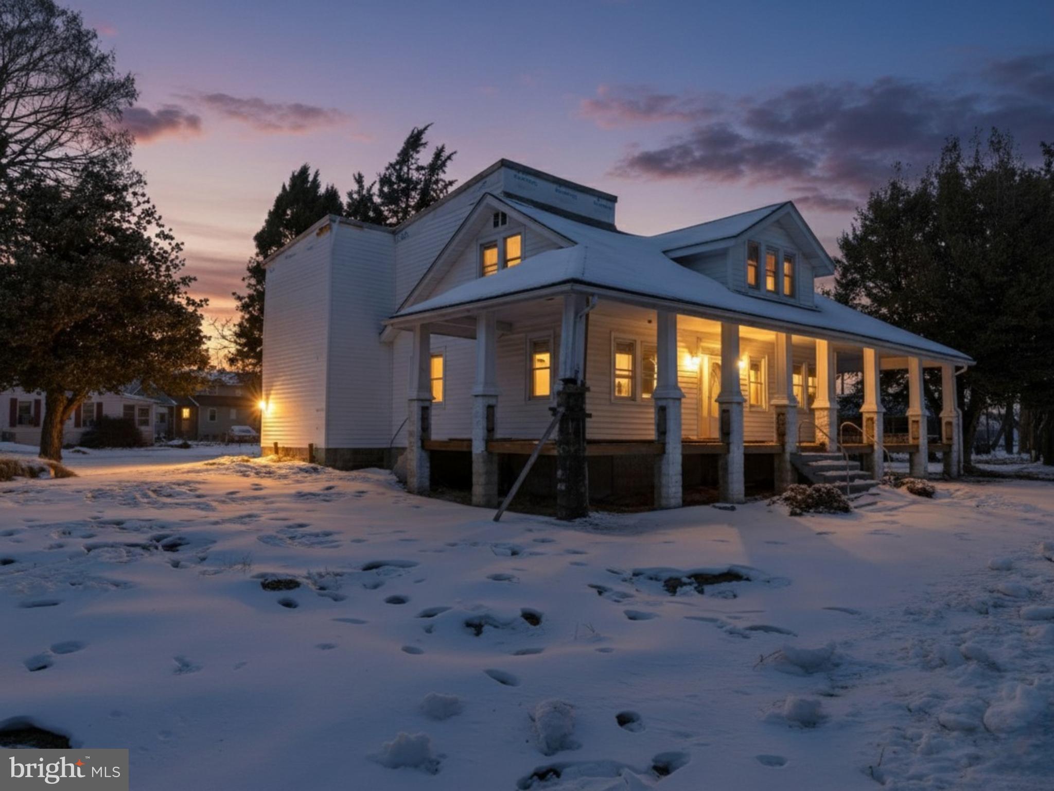 a view of a house with backyard porch and sitting area