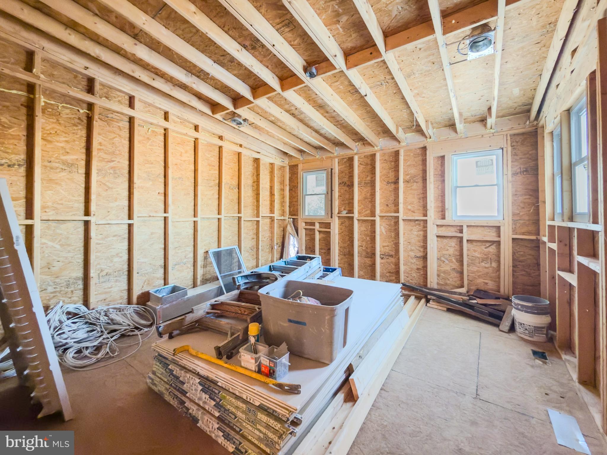 2224 Middleborough Road Essex, MD 21221 - Photo 17 of 50 a living room with furniture and a floor to ceiling window