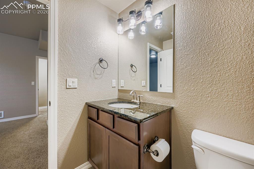 10625 Slumber Ridge Way Colorado Springs, CO 80908 - Photo 23 of 36 adjoining bath to bedroom 3