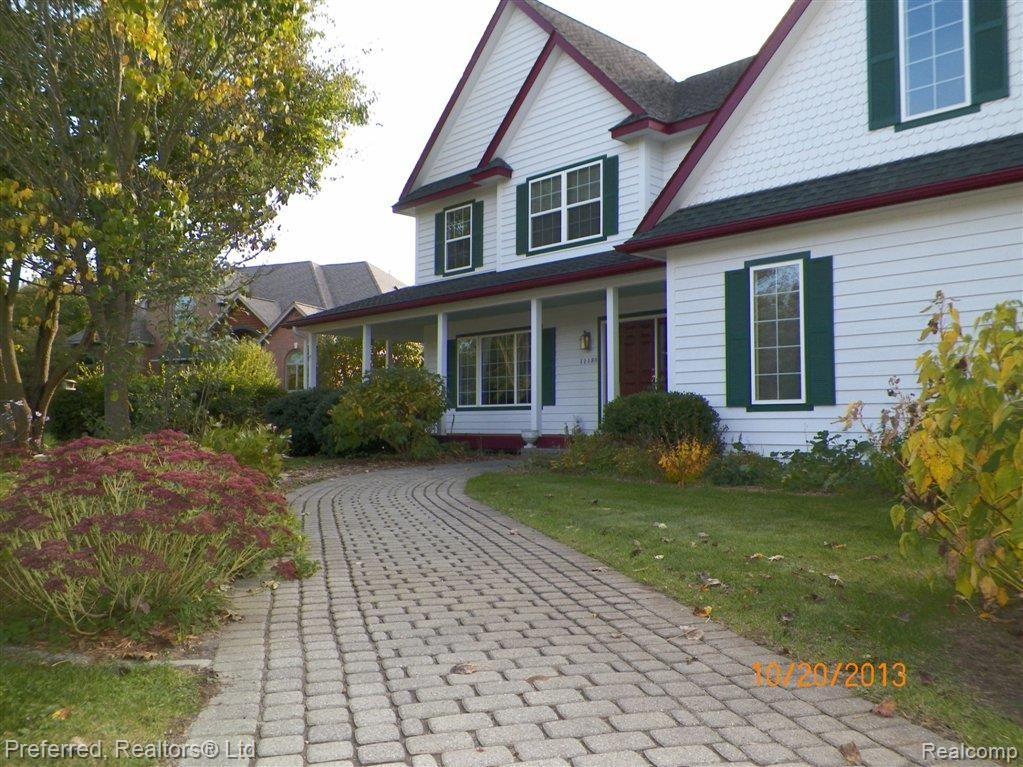 11180 Rivendell Court Pinckney, MI 48169 - Photo 11 of 35 6 ft. wide "Brick Paver" walk