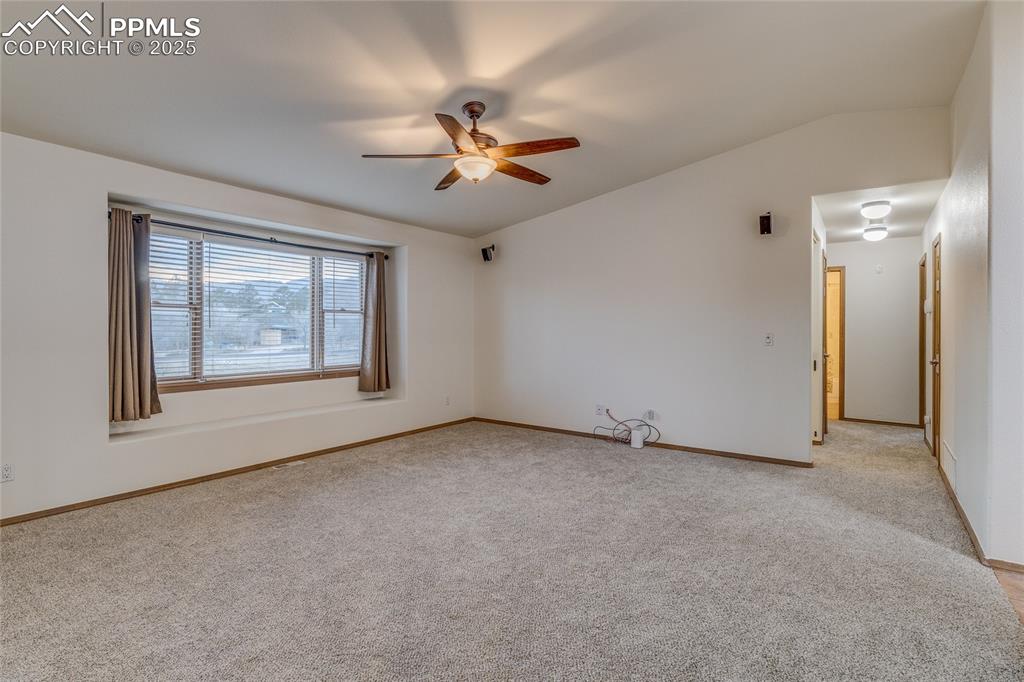 7501 Tudor Road Colorado Springs, CO 80919 - Photo 18 of 48 Living room looking towards hallway and two bedrooms/guest bathroom