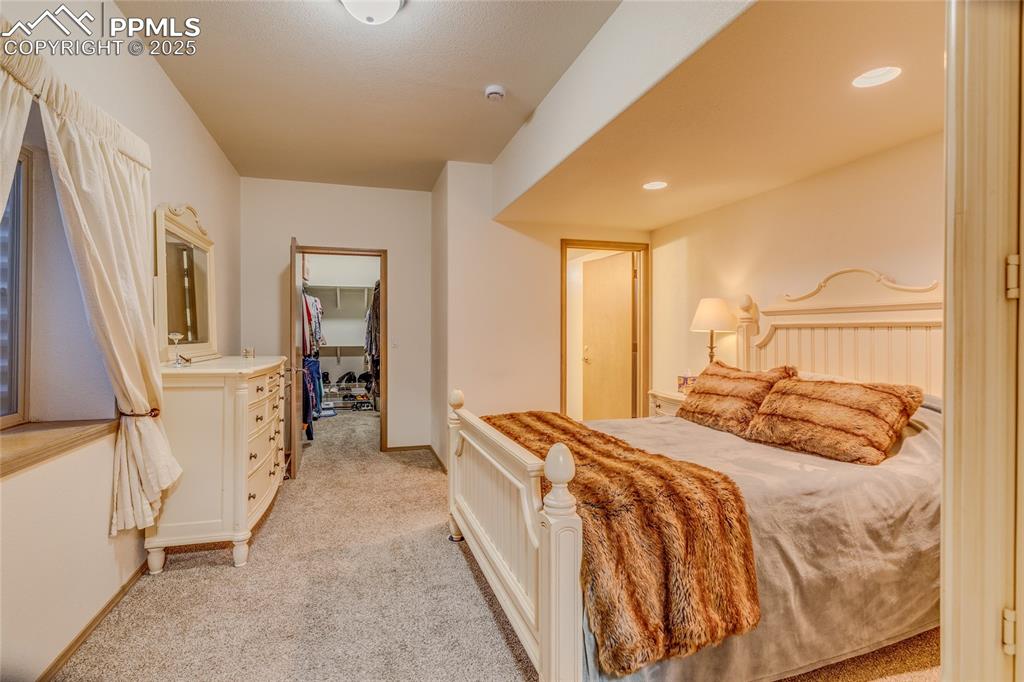 7501 Tudor Road Colorado Springs, CO 80919 - Photo 36 of 48 Secondary suite with walk in closet and full bathroom