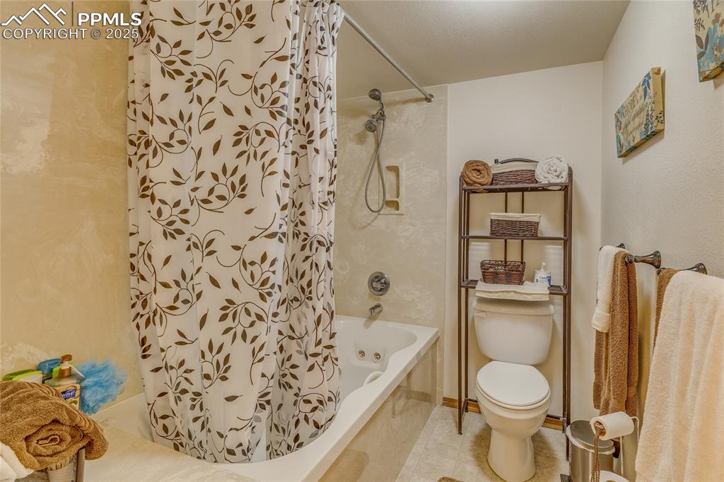 7501 Tudor Road Colorado Springs, CO 80919 - Photo 39 of 48 Ensuite full bath with jetted tub at secondary suite in basement