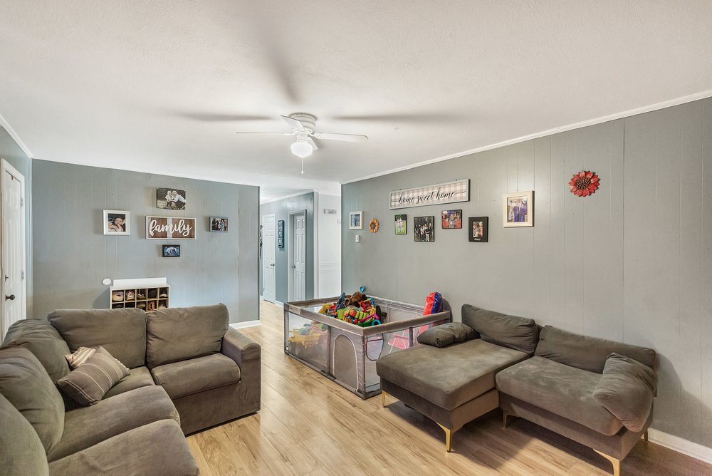 920 White Cut Road Walhalla, SC 29691 - Photo 3 of 23 This relaxed living space features durable wood flooring, providing a comfortable and inviting atmosphere.
