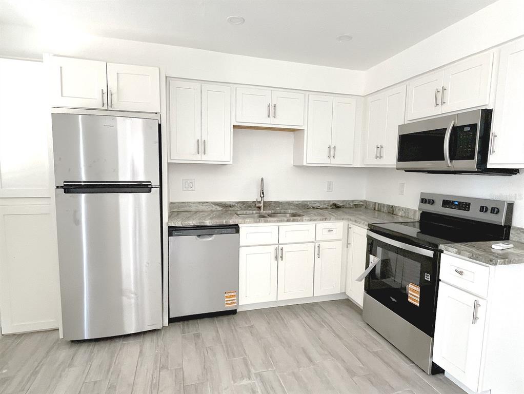 24 Lynn Way, Unit C Madeira Beach, FL 33708 - Photo 3 of 17