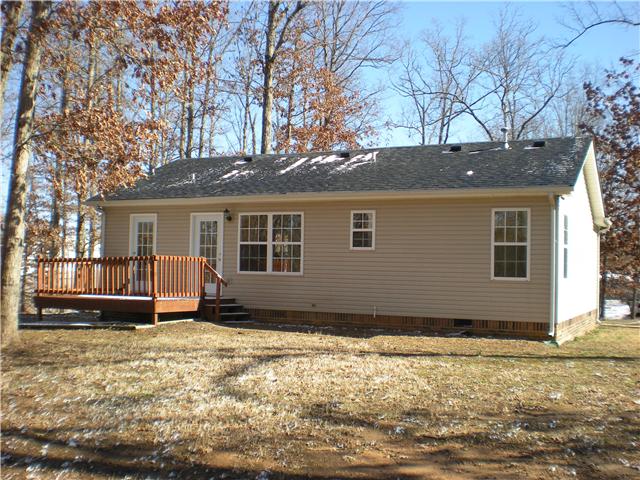 1008 Wildcat Road Dickson, TN 37055 - Photo 2 of 12 a front view of a house with a yard