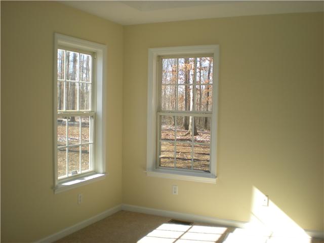 1008 Wildcat Road Dickson, TN 37055 - Photo 7 of 12 a view of an empty room with windows