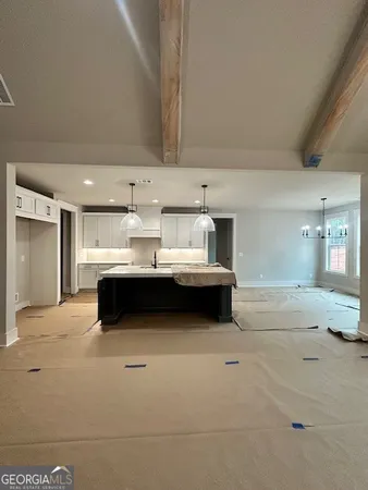 a spacious bathroom with a tub and a shower