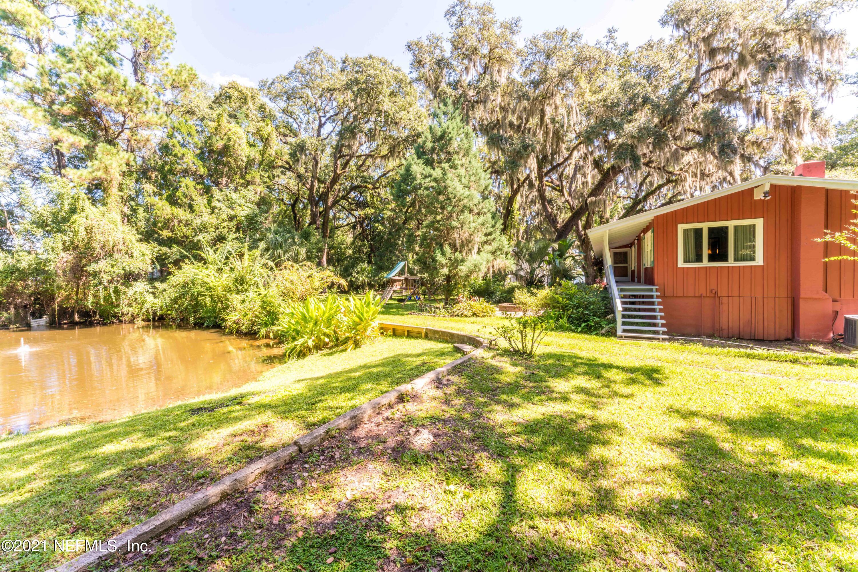 634 River Road Orange Park, FL 32073 - Photo 48 of 54 View of Cottage and Pond