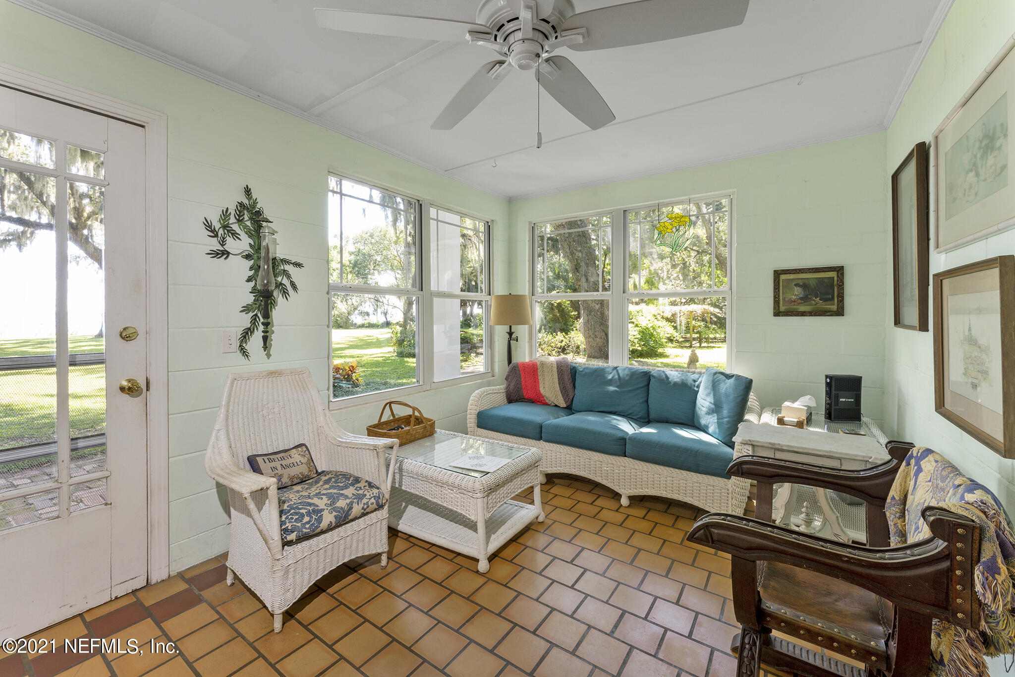 634 River Road Orange Park, FL 32073 - Photo 7 of 54 River side entry and view of sunroom