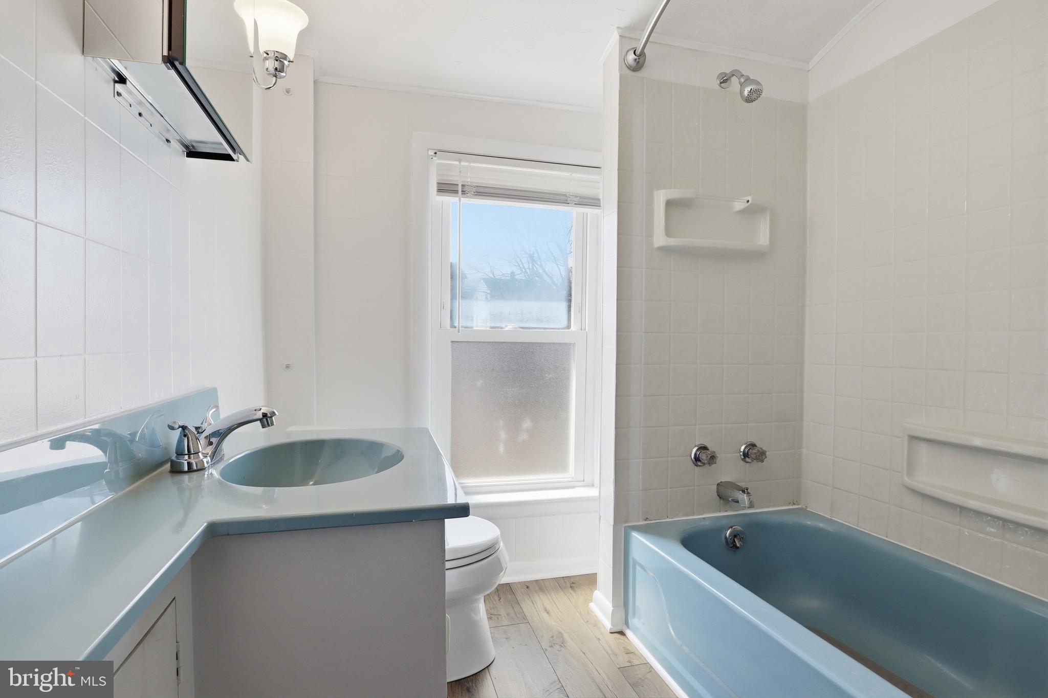 543 Baer Avenue Hanover, PA 17331 - Photo 19 of 51 a bathroom with a granite countertop sink a toilet and bathtub