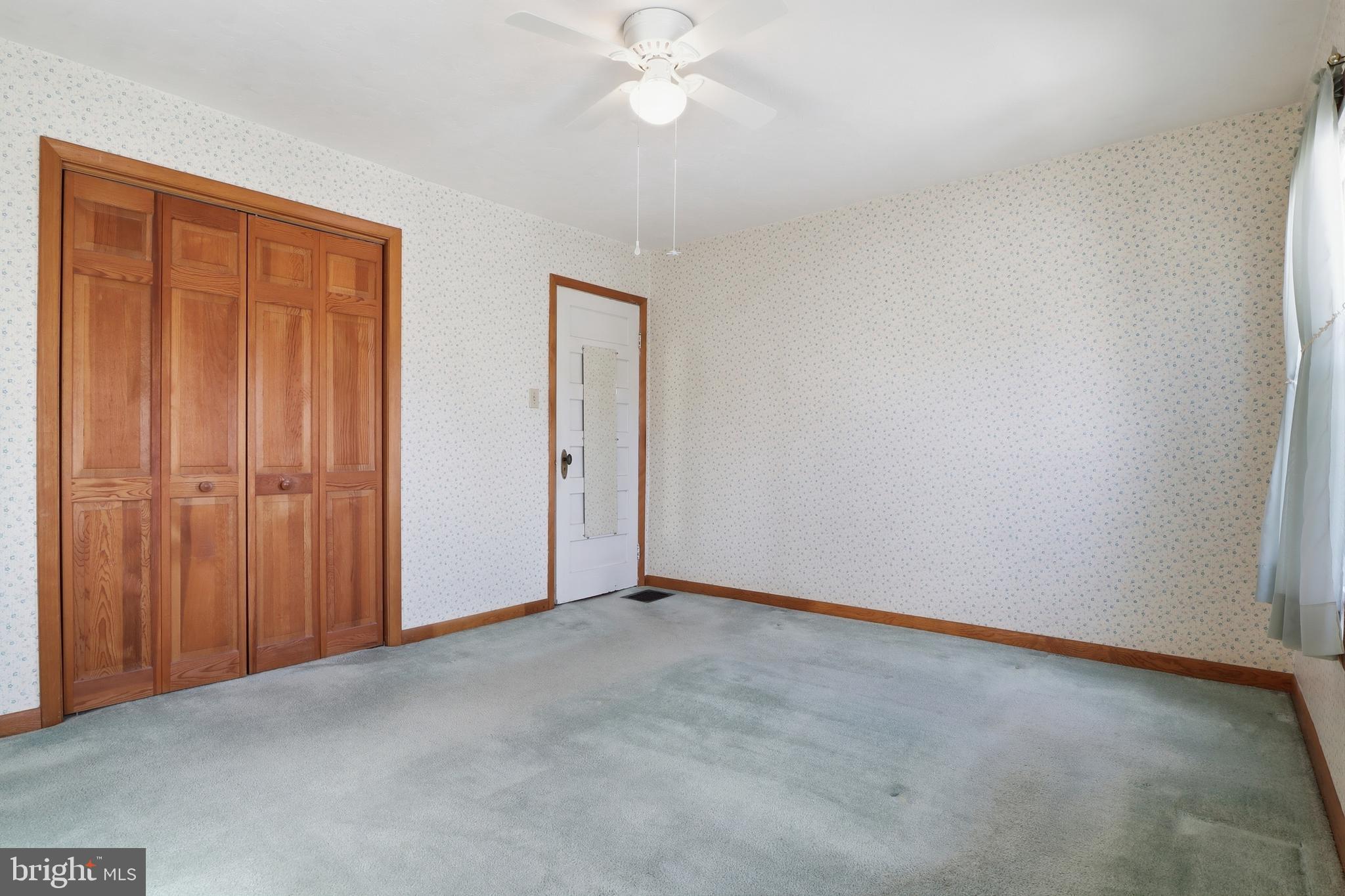 543 Baer Avenue Hanover, PA 17331 - Photo 25 of 51 a view of an empty room and chandelier fan