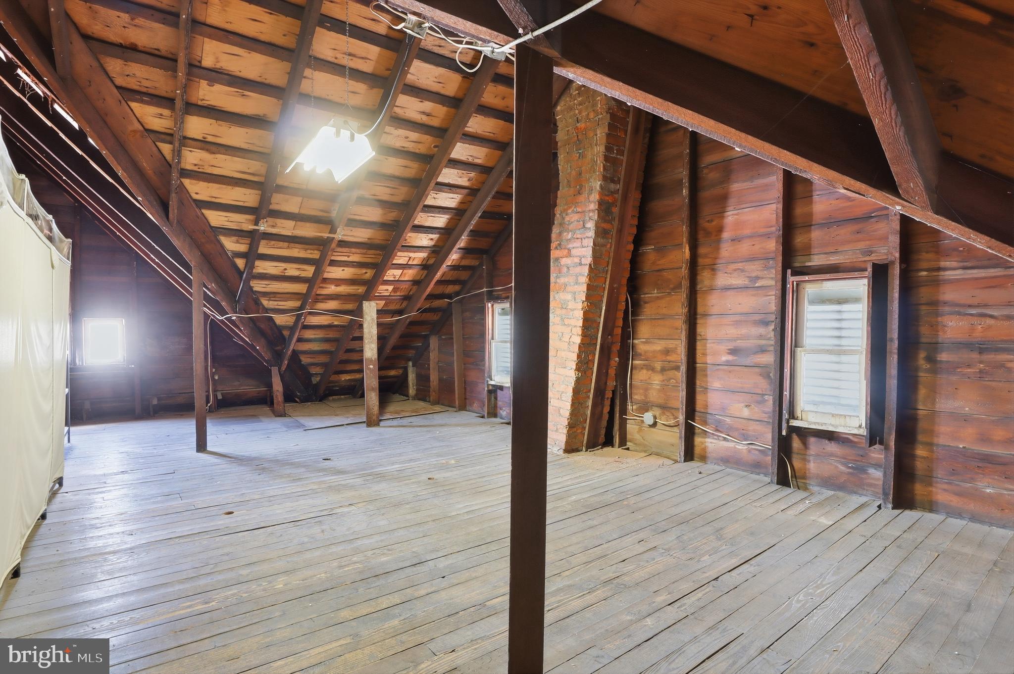 543 Baer Avenue Hanover, PA 17331 - Photo 27 of 51 a room with wooden floor and windows