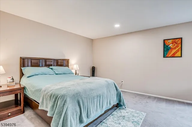 a bedroom with a bed and furniture