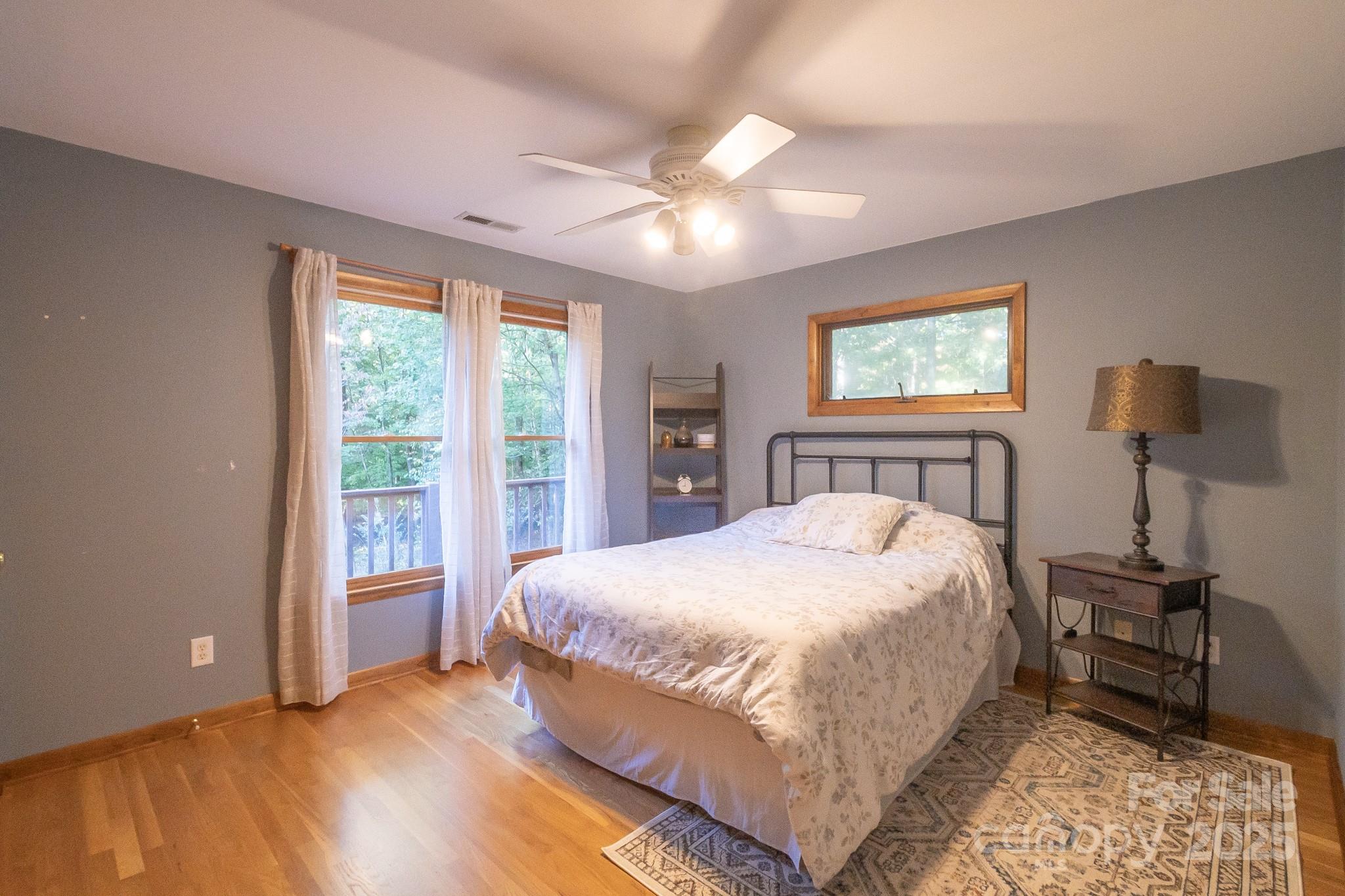 5214 Addison Road Waxhaw, NC 28173 - Photo 14 of 23 a bedroom with a large bed and a window