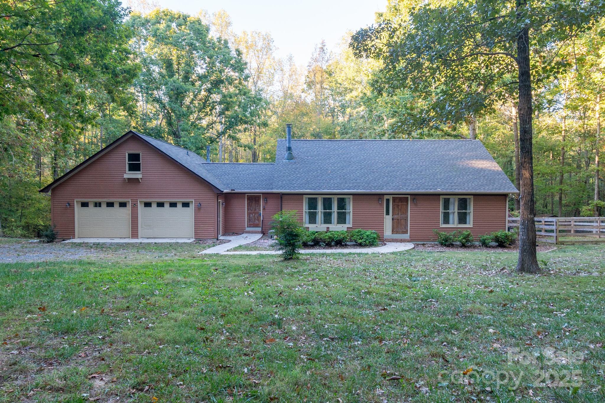 5214 Addison Road Waxhaw, NC 28173 - Photo 2 of 23 a view of a house with a yard