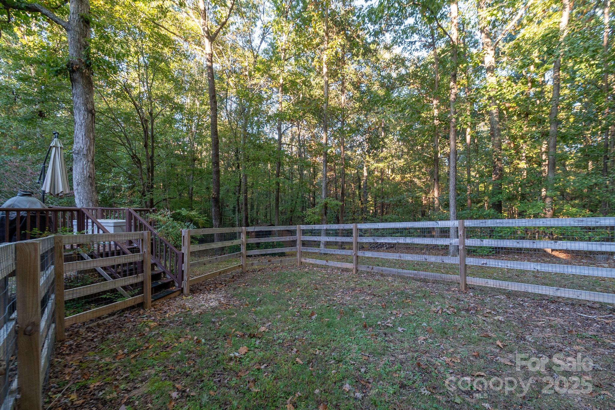 5214 Addison Road Waxhaw, NC 28173 - Photo 4 of 23 a view of park with wooden fence
