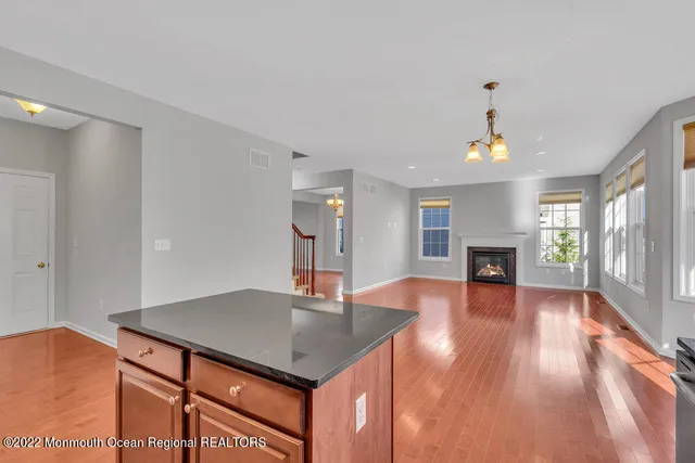 a view of a hallway with entryway to bedroom