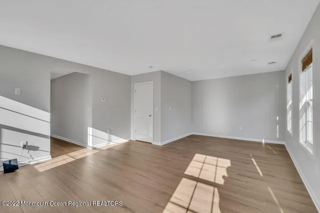 a bath tub sitting next to a window