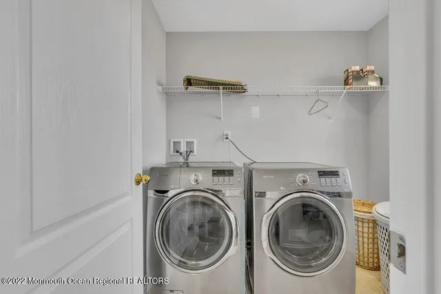 a view of a house with a backyard and a slide