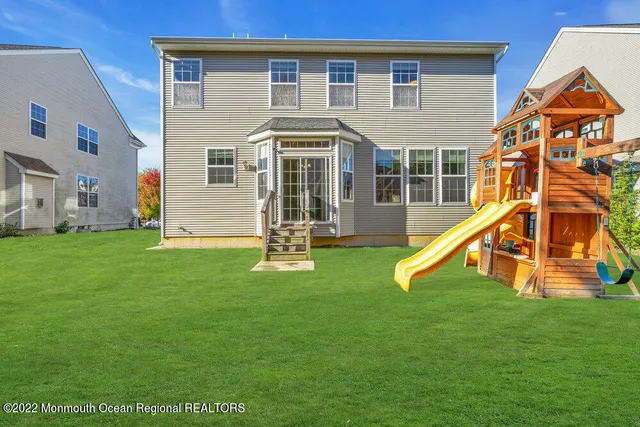 a view of a park with plants and trees
