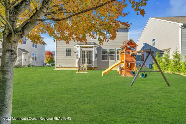 a view of a swimming pool with chairs