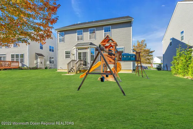 a view of a field and basketball court