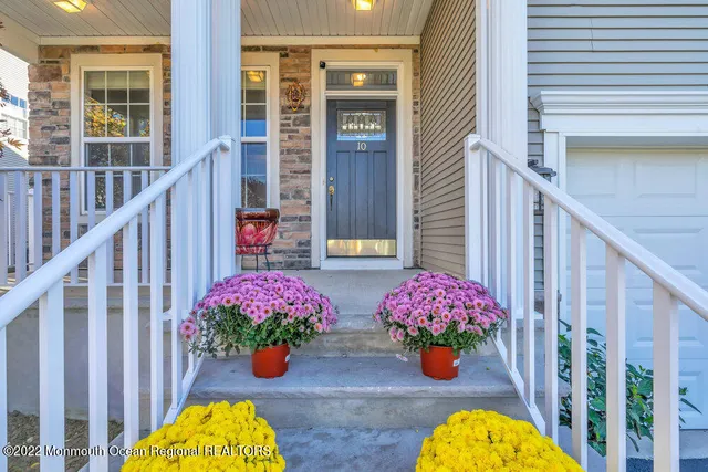 a view of balcony filled with furniture